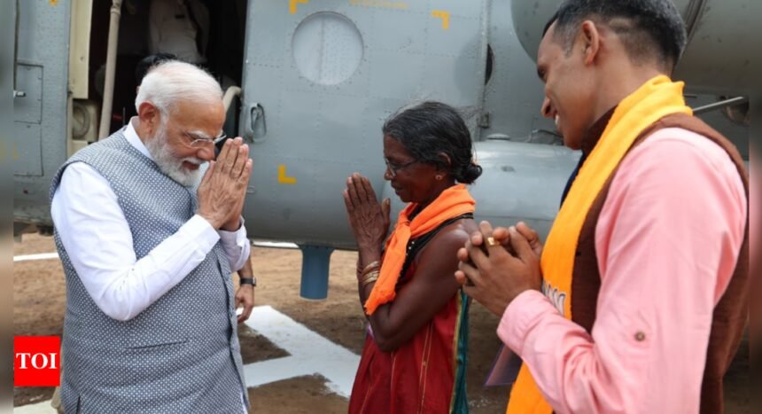 PM Modi meets local fruit seller Mohini Gowda in Karnataka's Sirsi | India News