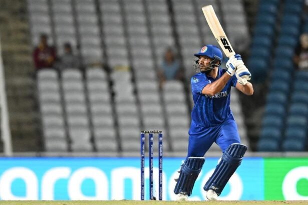 Afghanistan beat PNG to advance at T20 World Cup as NZ eliminated