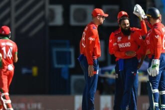 England beats Oman by 8 wickets to boost chances at T20 World Cup