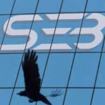 NSE, ex-MD settle case with Sebi for Rs 643 crore