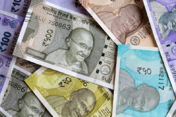 Rupee breaches 84 as oil prices, foreign outflows put strain