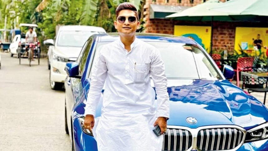 The auto driver who now roams in a BMW is face of the gang