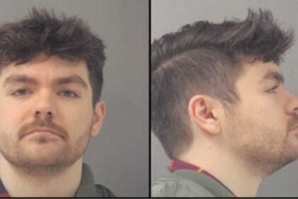 Far-right influencer Nick Fuentes charged with battery, posts own mugshot on social media